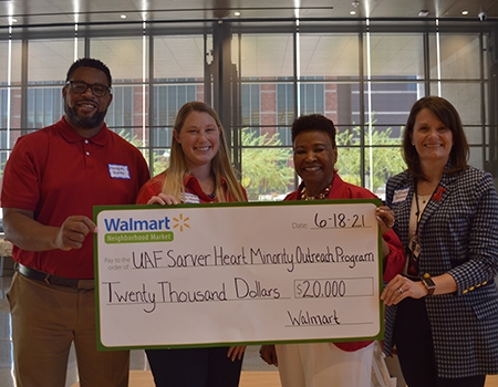 Marques Hunter, Dr. Amber Pate-Mozroll, Wanda Moore and Dr. Elizabeth Juneman