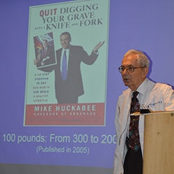 Dr. Frank Marcus delivers a lecture on obesity.