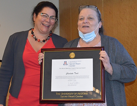 Dr. Nancy K. Sweitzer presents the Bateman Service Award to Charlotte Todd